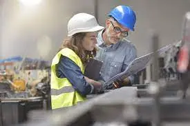 Man discussing his work to a lady