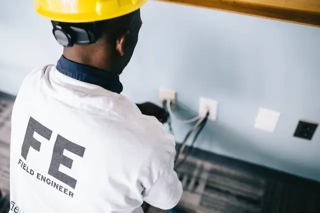 field engineer works with wire for power infrastructure